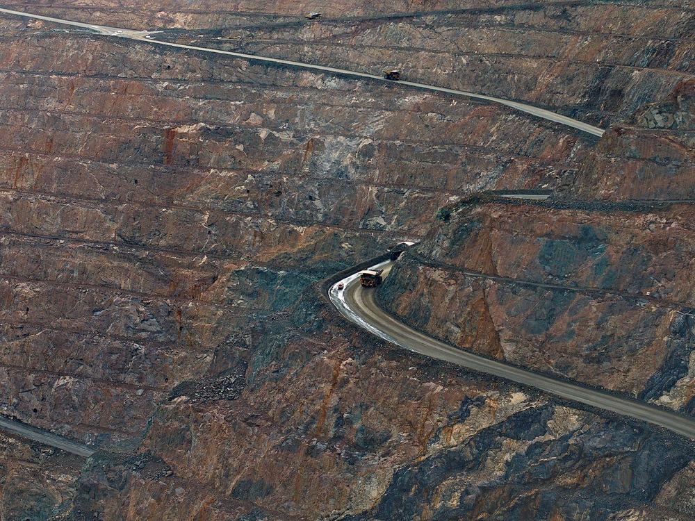 Haul roads winding across a mine, seen from directly above